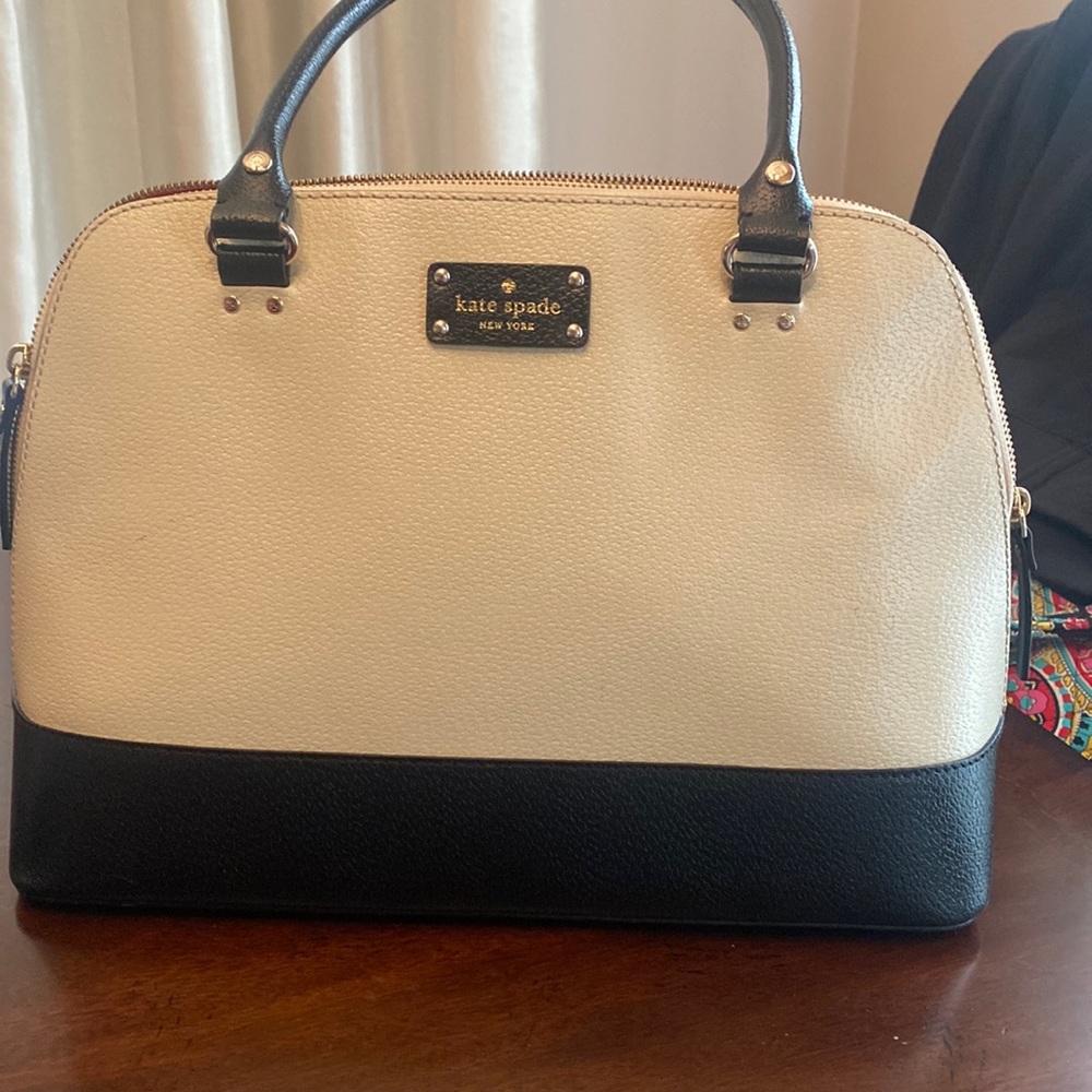 Kate Spade purse white with black and red interior same as new